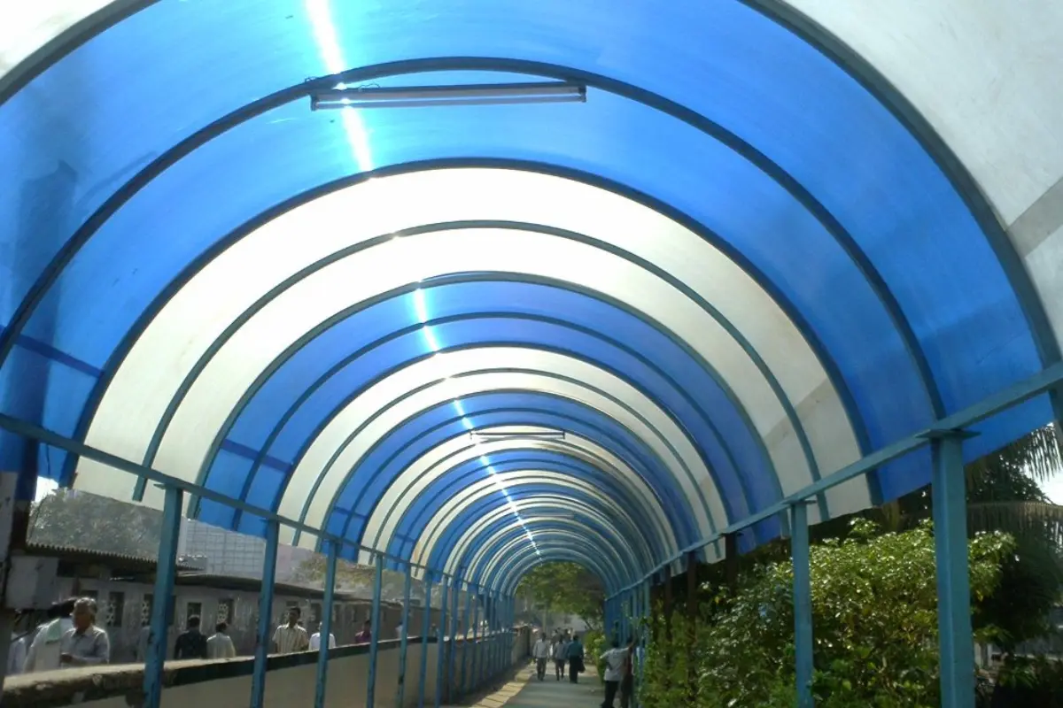 Indoor basketball court with side cover walls showcasing, ShadeCo expertise in prefabricated sports structures in India.