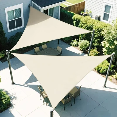 Patio shade sails installed for residential outdoor living and seating spaces