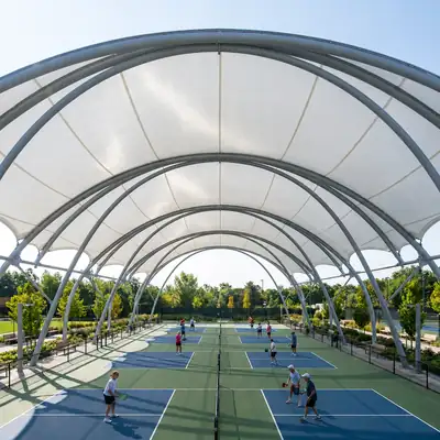 Volleyball court shade structure for recreational and professional play