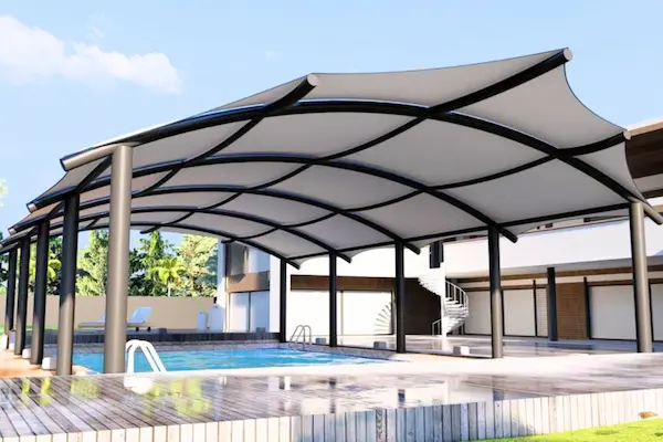 A covered patio with a swimming pool, designed for shade and comfort, ideal for outdoor relaxation and
                                                    socializing.