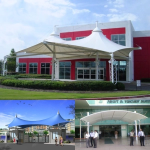 Entrance tensile canopy for building entry and drop off zone